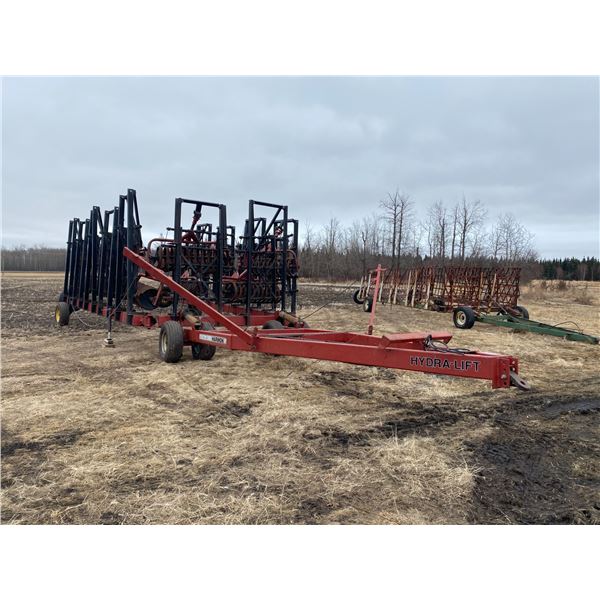 (Selling off-site, Atmore PH (780) 212-0073) 1994 Harmon Hydralift 60 ft harrow packer bar, SN. A217