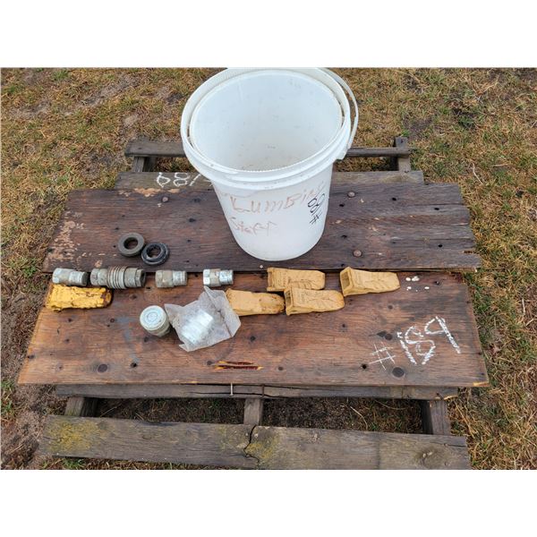 (Lots 184 to 189 are group lots) Fits John Deere 410G backhoe. Hyd couplers & teeth for backhoe.