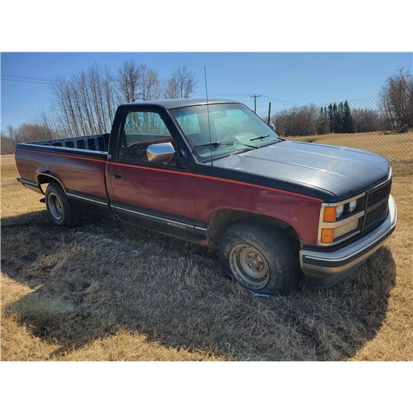 1989 Chevy Silverado, V8 auto, showing 232,588 km, air & power windows, running, poor tires, SN. 2GC