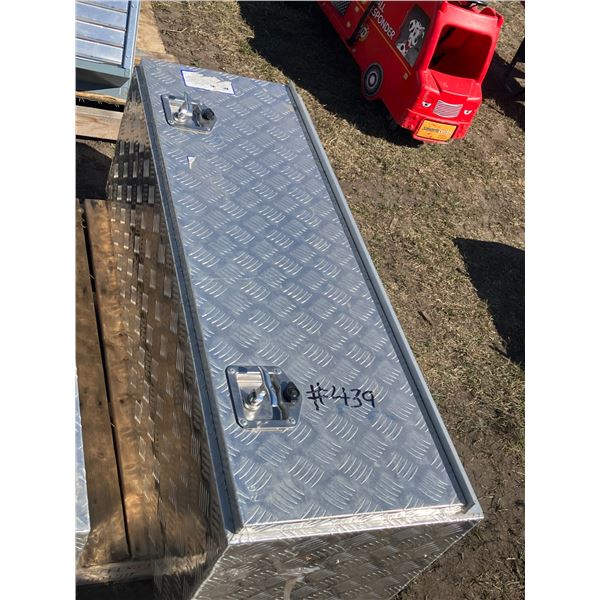 Aluminum storage box. 48" long, 16" high, 16" wide. Has keys.