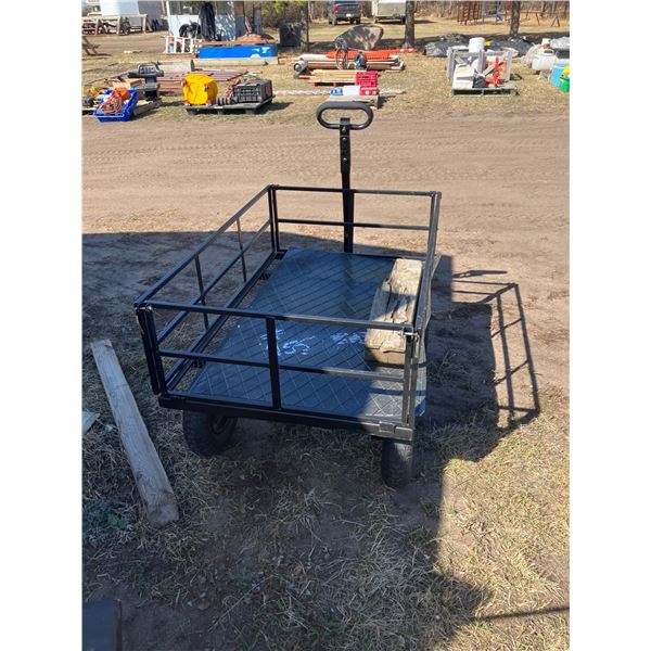 4 wheel wagon. 30" X 46". Fold down sides.