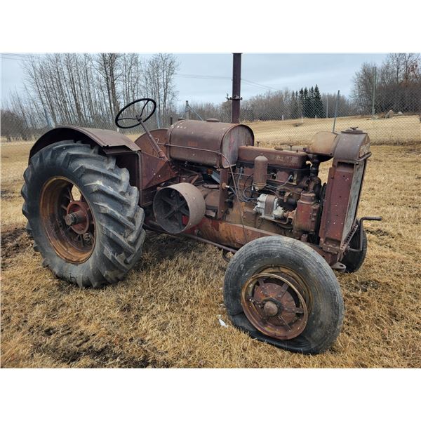 (Lots 50B & 50C are a Group Lot) McCormick W-30 tractor, not seized on rubber, SN. WB31224. PH Ted (