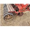 Image 4 : IH 100 press drill 12 Ft, C/W grass & fertilizer rubber packers, hyd. Ram & 2 newer front tires