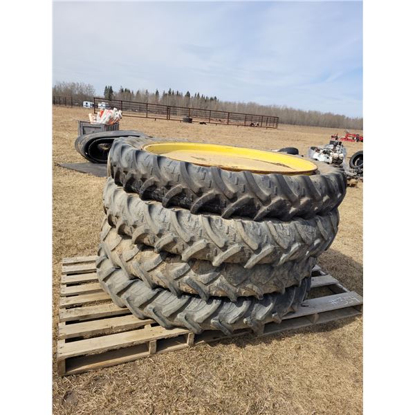 (So much each x 4) 270/95R48's c/w 10-hole JD sprayer rims, Located in N.Side field