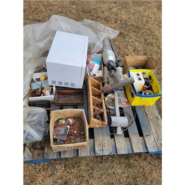 Pallet of misc. hose clamps, screws, microwave, heater, various new hardware etc.