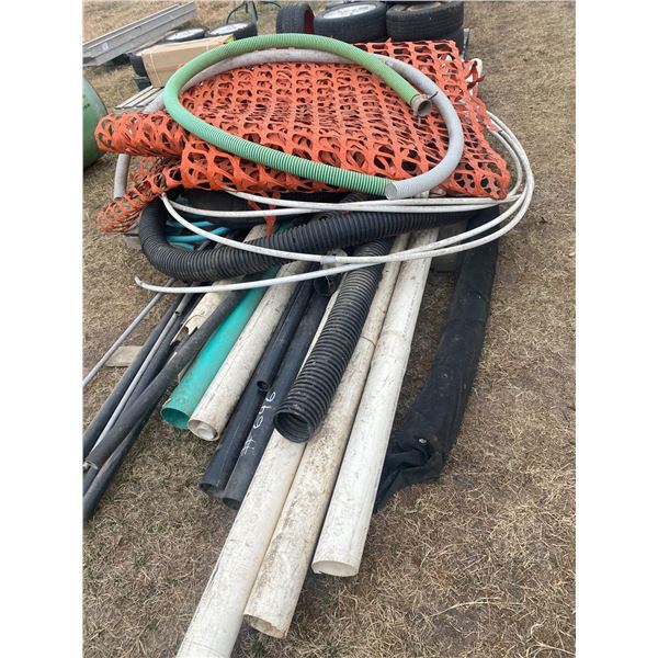 Pallet of plastic pipe, hose, snow fence, Located in N.Side field
