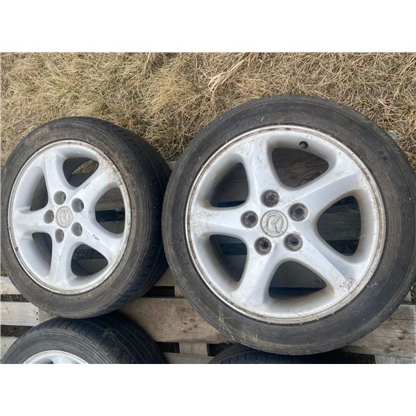 (Sells all together) 4 tires. R16 c/w rims, Located in N.Side field