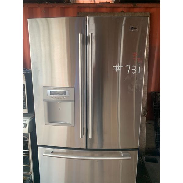 LG 3 door fridge. Ice + water dispenser. Works good.
