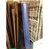 Image 1 : Large group of black & blue fabric rolls