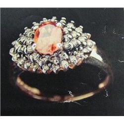 Padparadscha Sapphire and Diamond Lady's Ring, 14 K yellow gold- Padparadscha sapphire is oval, face