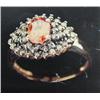 Image 1 : Padparadscha Sapphire and Diamond Lady's Ring, 14 K yellow gold- Padparadscha sapphire is oval, face