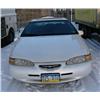 Image 1 : 1996 Ford Thunderbird, 2-door, sun roof- VIN #1FALP62W8TH138961, mileage reading 118,348- minimum bi
