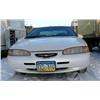Image 4 : 1996 Ford Thunderbird, 2-door, sun roof- VIN #1FALP62W8TH138961, mileage reading 118,348- minimum bi