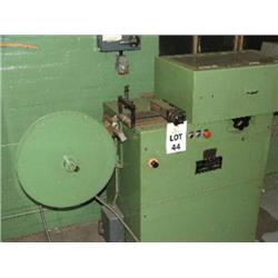 INDUSTRAL AWM 100 SLOT CLOSURE MACHINE