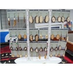 Lot of Ivory earrings including display stand (114)