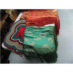 Bottom shelf which includes:  hand hooked rug, 2 fabulous table cloths or Shawls, Silk embroidered c