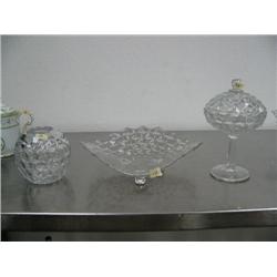 3 Pieces of beautiful heavy cut glass Fostoria, covered candy dish, rose bud vase, and 11" footed Pl