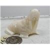 Image 1 : Carved ivory walrus by R. Silook with inset baleen eyes, 2-1/2" (86)