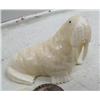Image 2 : Carved ivory walrus by R. Silook with inset baleen eyes, 2-1/2" (86)