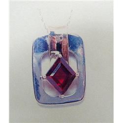 Garnet Pendant and Chain, 14 K yellow and white gold- garnet is diamond-shaped, faceted, approx. 1.0