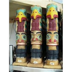 Lot of 14 Alaska style totems- not Alaskan- approx. 17" tall (114)