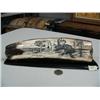 Image 1 : Outstanding 11" fossilized ivory ice axe scrimshawed by Homer Cole mounted on baleen- has 2 wolves o