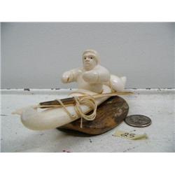 6-1/2" white ivory kayaker on fossilized ivory base by Iglaak (114)