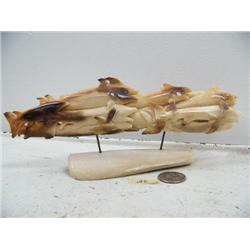 9" fossilized walrus ivory imported from Indonesian of 15 carved fish (114)