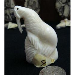 2-1/2" white walrus ivory carved walrus over a man's face (114)