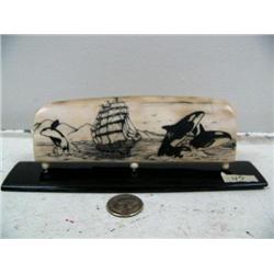 Mammoth ivory bark 6-1/2" long by Homer Cole scrimshaw of sailing ship, 4 killer whales mounted on b