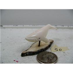 2-1/2" white walrus ivory whale mounted on fossilized ivory by Iglaak of Koyuk, AK (114)