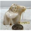 Image 1 : 2" fossilized walrus ivory carving of walrus, whale's tail, and man by Iglaak of Koyuk (114)