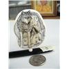 Image 1 : 3" ivory platchet scrimshawed wolf by Homer Cole mounted on baleen (114)