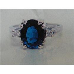 Sapphire and Diamond Lady's Ring, 14 K white gold- sapphire is oval, faceted, approx. 2.85 carats, t