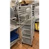 Image 1 : 3 ASST ROLLING BAKERS RACKS WITH CONTENTS. BAKING PANS, FOOD PANS, LIDS ETC