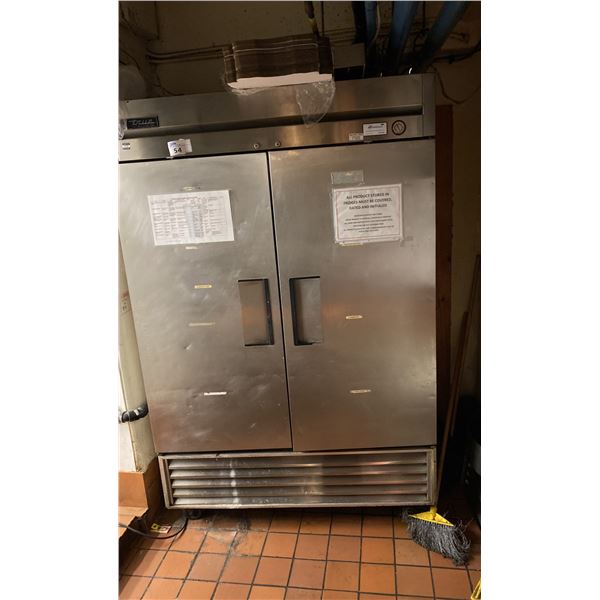 TRUE COMMERCIAL REFRIGERATOR. 54 WX 7'H MODEL T-49. WEATHER SEAL NEEDS ATTENTION