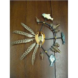 Spirit mask by Patrick Sowle- wood, feather, soapstone