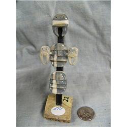 Blue ivory King Island masks by Mark Seeganna with baleen and whale bone- approx. 5" tall