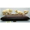 Image 1 : 10" ivory carving of bear and wolf fighting by Noel Smith