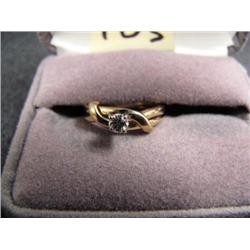 Lady's 14k yellow gold and diamond solitaire ring. Approx. .20 cts. Set in 4 prong head - retail val