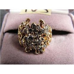 Custom made yellow gold and diamonds cluster style ring. 26 .05-.10 cts. Each diamonds channel set. 