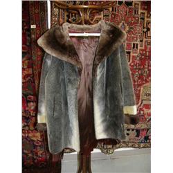 Fur coat - Lady's 3/4 length seal approx. XL - bottom hem needs repair (134)
