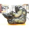 Image 1 : 10" old Canadian Eskimo soapstone carving of a man working on a seal- retail value of about $4,000 (