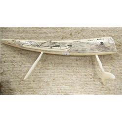 10" scrimshawed ivory by Simon Pushruk ca. 1960- one side it has man in kayak harpooning a walrus; o