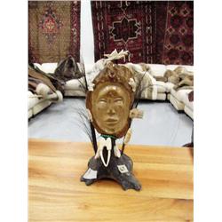 Bone mask mounted on bone- with carved ivory animals and King Island masks, baleen, green bead neckl
