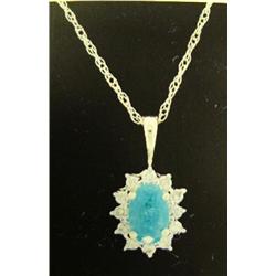 Emerald and Diamond Pendant and Chain 14k yellow gold oval, faceted emerald approx. .5 carats, semi-