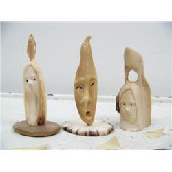 Group of 3 ivory carvings: whale and man, eagle and man, lady (114)