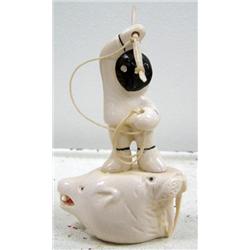Mammoth ivory carving done by Iglaak of Koyuk 4" tall of hunter standing on a polar bear and walrus 