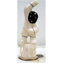6-1/4" white ivory hunter mounted on walrus and man's head fossilized ivory base by Iglaak from Koyu