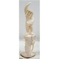 6-3/4" white walrus ivory totem carved with walrus man, walrus and man's face by Iglaak (114)